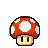 A red mushroom with white spots, a golden star, a green turtle, and a gold coin.