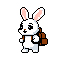 A white rabbit with a brown backpack runs with its ears perked up.
