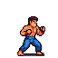 Bare-chested martial artist in blue pants, mid-combat, throwing a jab and a straight punch.