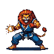 Anthropomorphic lion martial artist in a blue gi with a black belt, extending its left arm to unleash a bright energy projectile. The lion has a fiery orange and yellow mane and tail.