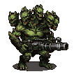 A hulking, four-headed green creature with armored plating wields a massive minigun, poised to fire.