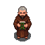 Solemn monk from above, holding a holy book with green patterns.