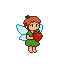 A small pixie with auburn hair and a green tunic holds a red strawberry. Her light blue wings are spread.