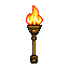 A flickering flame in yellows and oranges erupts from a metallic torch head, casting a warm glow against a black background.