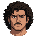 Man with dark curly hair, mustache, and goatee, wearing a blue stud earring in his right ear, with a serious, contemplative expression.