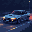 A blue coupe with illuminated headlights on a twilight road, viewed from a diagonal front angle.