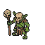 A menacing goblin in tattered green armor and a skull mask holds a gnarled staff with a bleached bone.