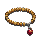 Wrist rosary with olive wood beads and a raw Blood Gem pendant.