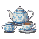 Winter tea set with teapot, sugar bowl, and teacup with saucer, decorated with blue snowflakes on white porcelain. Teacup contains dark liquid.