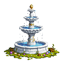Three-tiered white and gray stone fountain with gold accents and a golden finial, water cascading into a basin, surrounded by mossy ground with colorful jewel-like objects and wooden crates, against a black background.