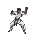 Karate fighter in a low, ready stance, wearing a white gi and black belt, with fists clenched and raised.