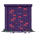 A shadowed wall made of dark purple and reddish-pink bricks, with green grass growing through cracked grey paving stones at its base.