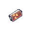 Cylindrical battery with a radiation hazard symbol, rusty red body, and a metallic cap.