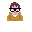 Pixelated character with brown hair, blue eyes, and black-rimmed glasses, wearing a mustard-yellow sweater over a white collar.