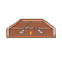 Starting blocks on a track with a yellow marker.