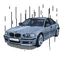 Silver BMW sedan with illuminated headlights, parked in a vertical rain shower against a black background.