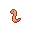 A pale pinkish-brown worm in an 'S' shape on a black background, with a single dark pixel for an eye.