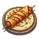 Durum kebab wrapped in flatbread, sprinkled with green herbs and red accents.